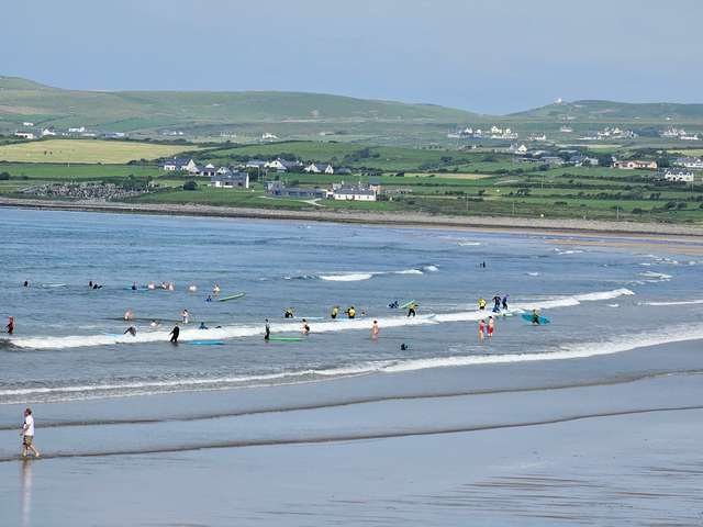 Just enough of a wave for the beginner surfers in the middle of the beach